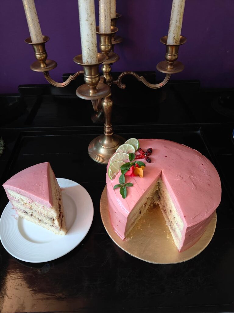 My first layered cake which didn't fall apart. Lime raspberry cake with lime pastry cream and raspberry jam with raspberry cream cheese and whipped cream frosting. My Asian dad loved this for his birthday because it wasn't too sweet.