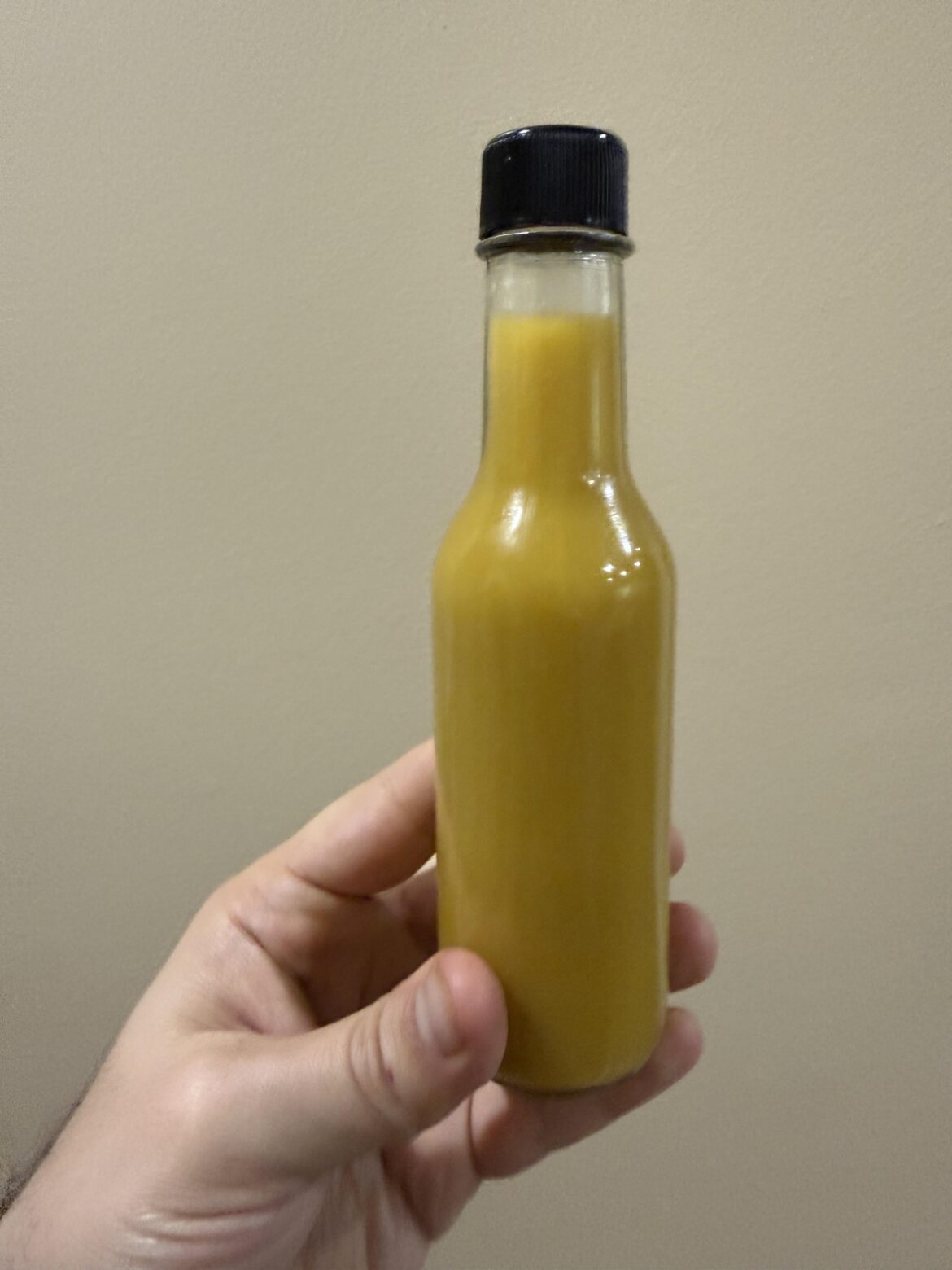 My strained fermented hatch chile/garlic/onion and blended in roasted garlic hot sauce.  What should I call it?? I’m thinking Southwest Sunset