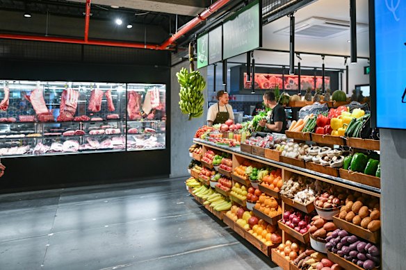 The original butcher and greengrocer stalls’ displays pictured at launch. 