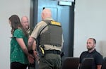Taylor Edwards, left, and her husband Blair Edwards, right, at their sentencing in Clackamas County circuit court, Sept. 8, 2025. The Edwards pleaded guilty to criminal mistreatment after they failed to seek medical care for their days old child, Hayden Edwards, in June 2023. The Edwards received 30 days jail time for the baby's death.
