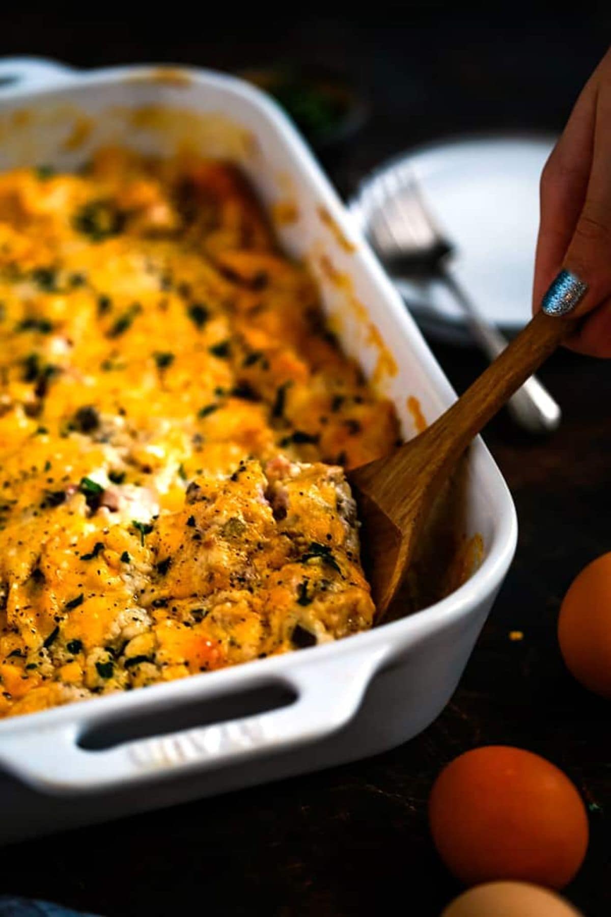 These 35 Scrumptious Make Ahead Brunch Casseroles will make your life over the holidays so much easier. Plus, everyone will be delighted with any one of these casseroles for the holidays. Bridge casserole in baking dish.