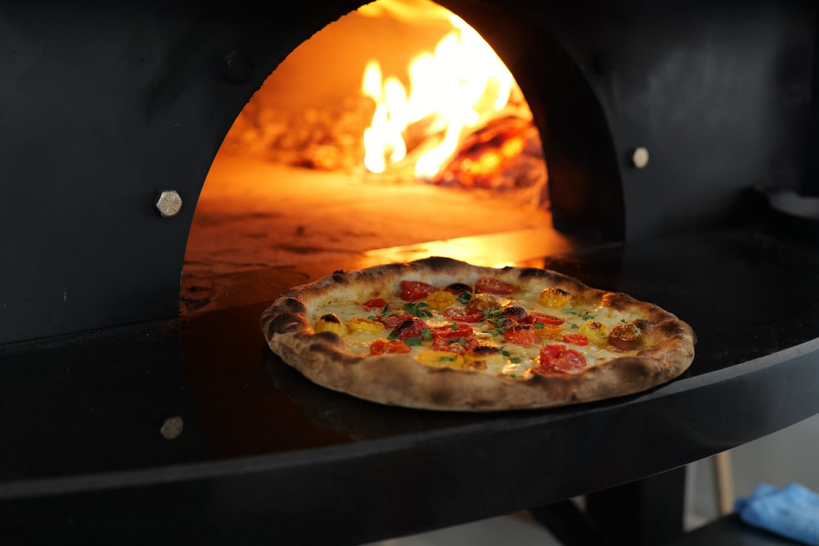 At Anna’s in Providence, R.I., Anthony Giordano is serving the wood-grilled pizza that first became popular when he was cooking out of his Anna’s Vesuviano food truck.