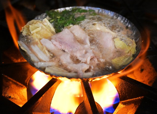 Kuro Buta Shabu on the stove at MaruJun in San...