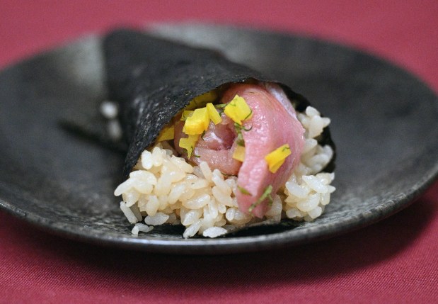 Toro Taku hand roll is served at MaruJun in San...