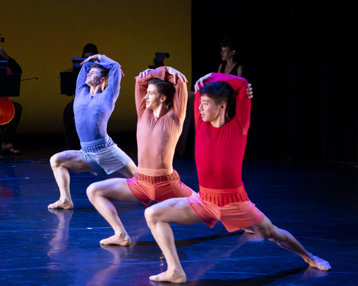 BalletX’s Mathis Joubert Shares His Sugar-Free French Crêpe Recipe three male dancers in a deep lunge as they cross their arms over their heads