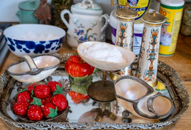 A variety of items in the kitchen of home cook...