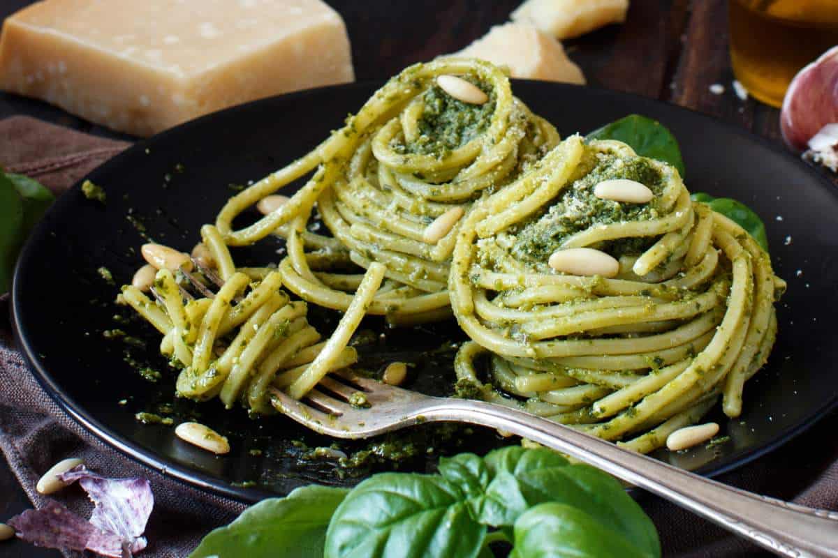 Pesto pasta on a plate from an Italian restaurant in Winnipeg