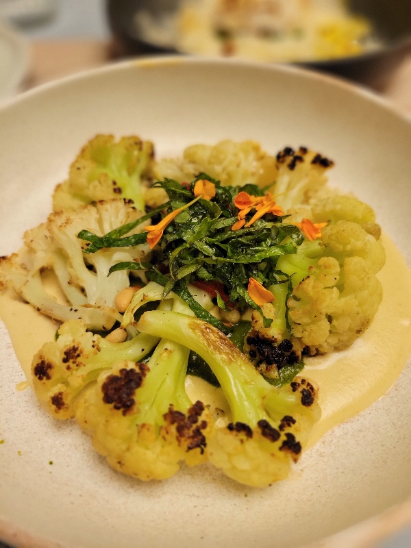 Roasted Cauliflower with pine nuts, pickled chilli, mint and basil at Abrielle