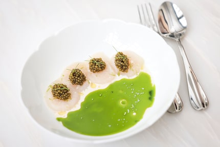 Scallop and caviar, an appetizer at Mamani, comes with a grass-green sauce tinted with dill...