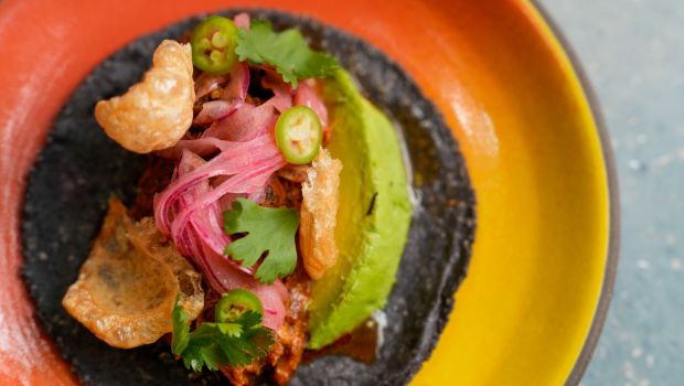 Food centerpiece with recipe for cochinita pibil from chef Raul Casillas. Cochinita Pibil Taco at Puesto in MIssion Valley on Tuesday, Aug. 19, 2025 in San Diego, California. (Alejandro Tamayo / The San Diego Union-Tribune)