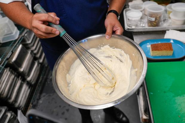 Casillas mixes up a passion fruit cream to use on...