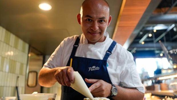 Food centerpiece with recipe for Tres Leches Cake from chef Raul Casillas. Casillas adding cream to the Tres Leches Cake at Puesto in MIssion Valley on Tuesday, Aug. 19, 2025 in San Diego, California. (Alejandro Tamayo / The San Diego Union-Tribune)