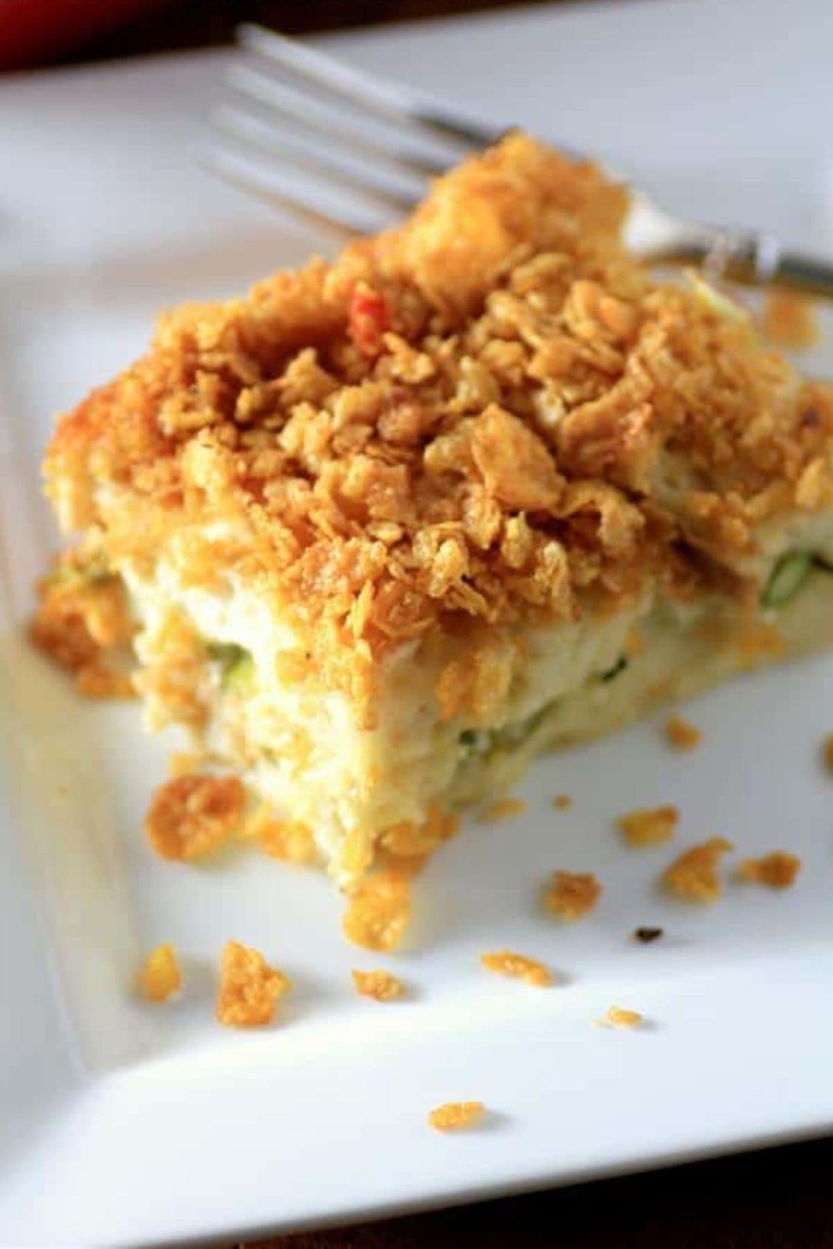 These 35 Scrumptious Make Ahead Brunch Casseroles will make your life over the holidays so much easier. Plus, everyone will be delighted with any one of these casseroles for the holidays. Veggie casserole on plate.