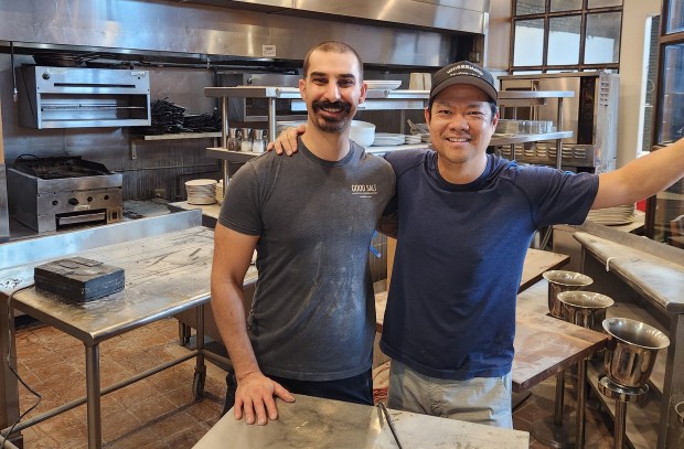 Chef/Partner Michael Cooper and Owner Jason Chin strike a pose in what will soon be Osteria Ester's bustling Thornton Park kitchen. (Courtesy Good Salt Restaurant Group)