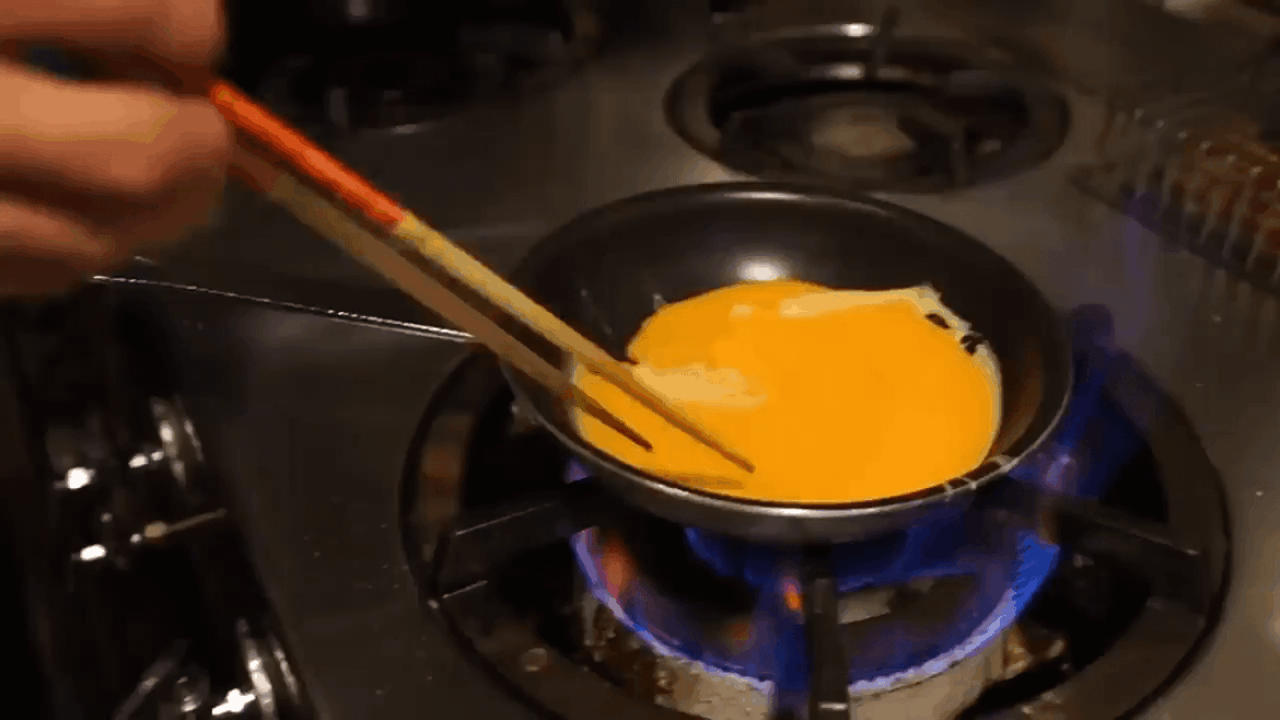 Japanese chef cooking Omurice, one of the hardest omelettes to prepare.