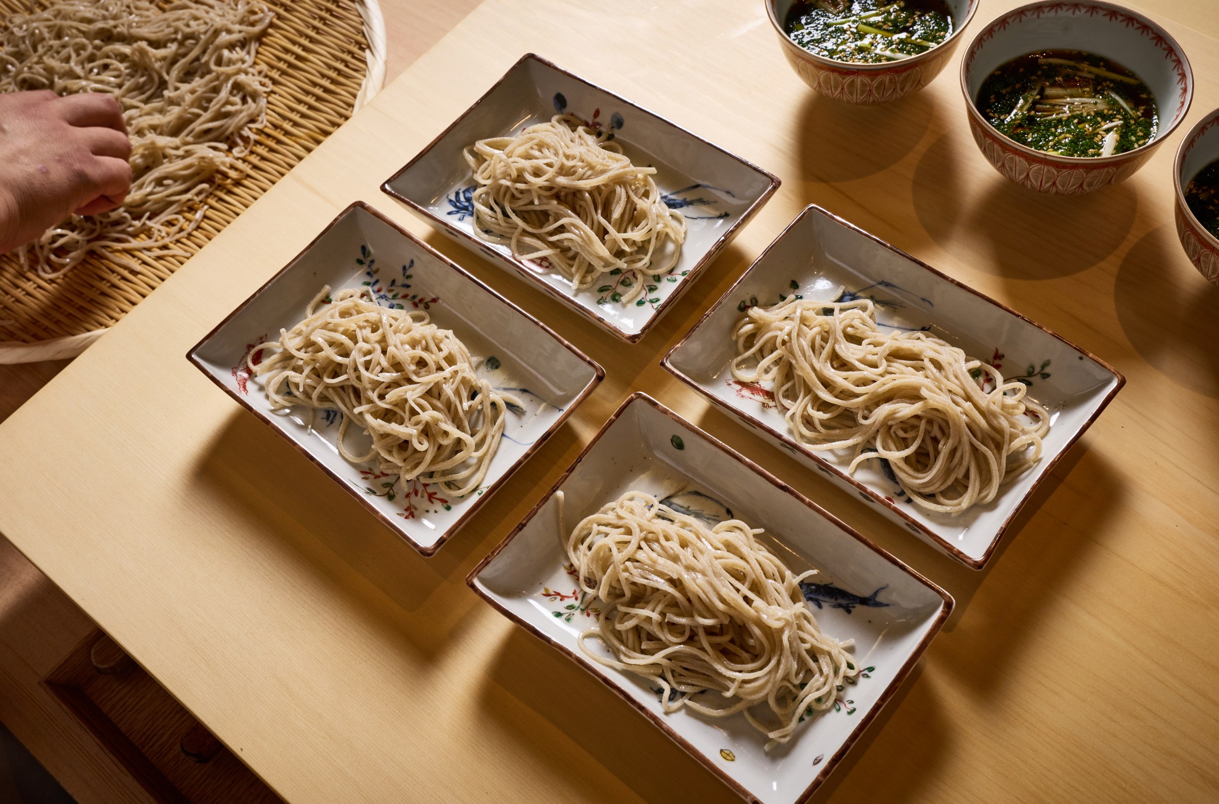 Rectangle bowls of noodles.