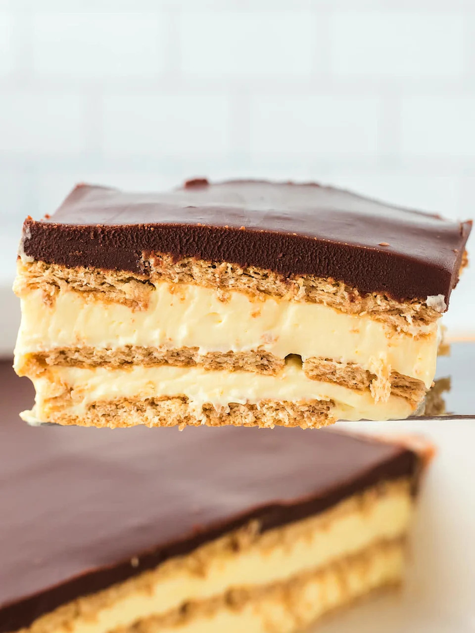 No-Bake Eclair Cake recipe by Cheerful Cook.