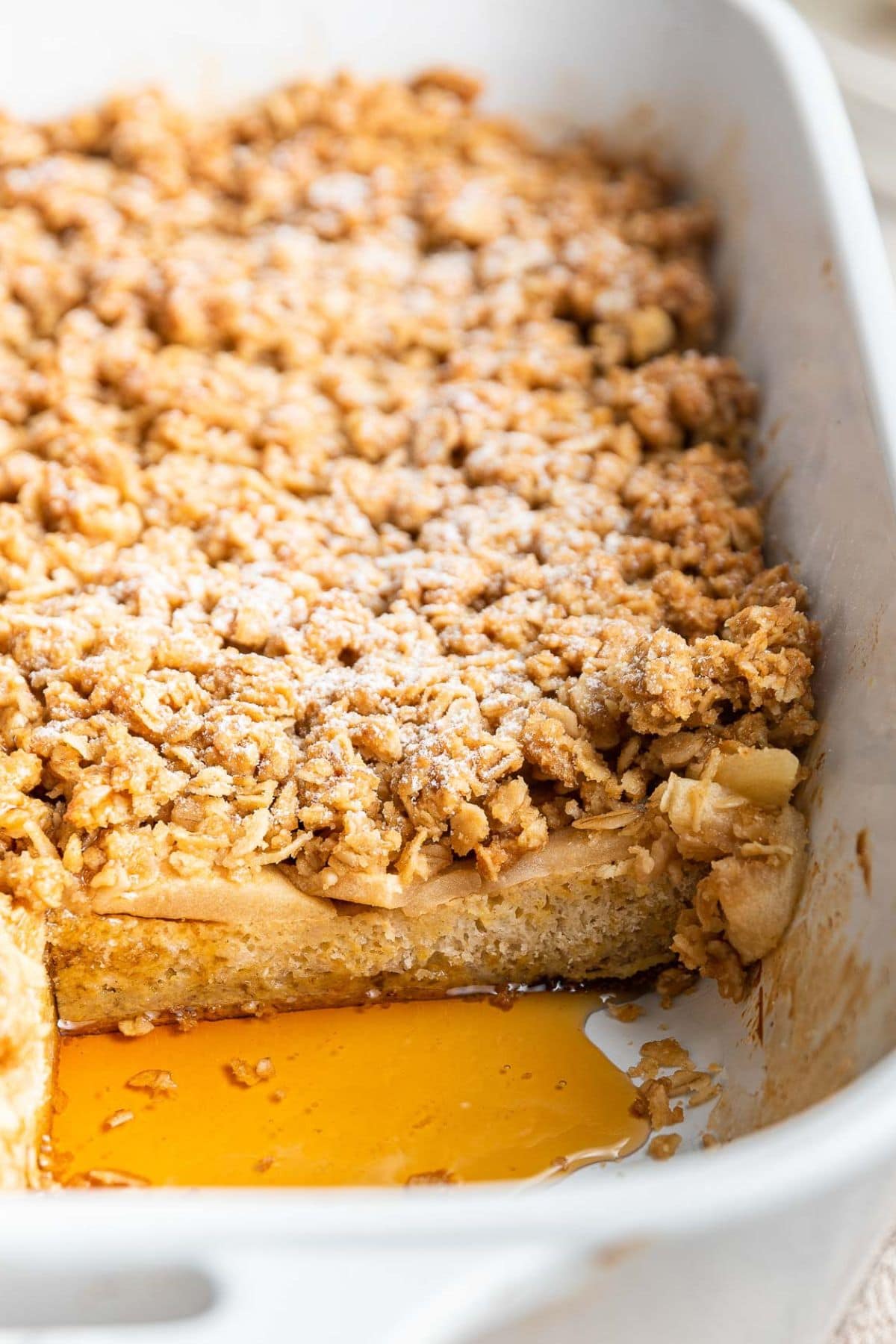 These 35 Scrumptious Make Ahead Brunch Casseroles will make your life over the holidays so much easier. Plus, everyone will be delighted with any one of these casseroles for the holidays. Apple crisp toast in baking dish.