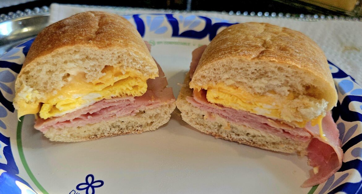 Ham, egg, and cheese on ciabatta for breakfast