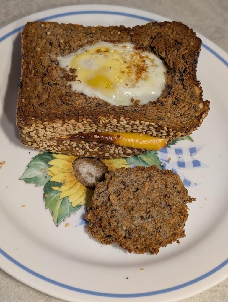 Grilled cheese as egg in a basket