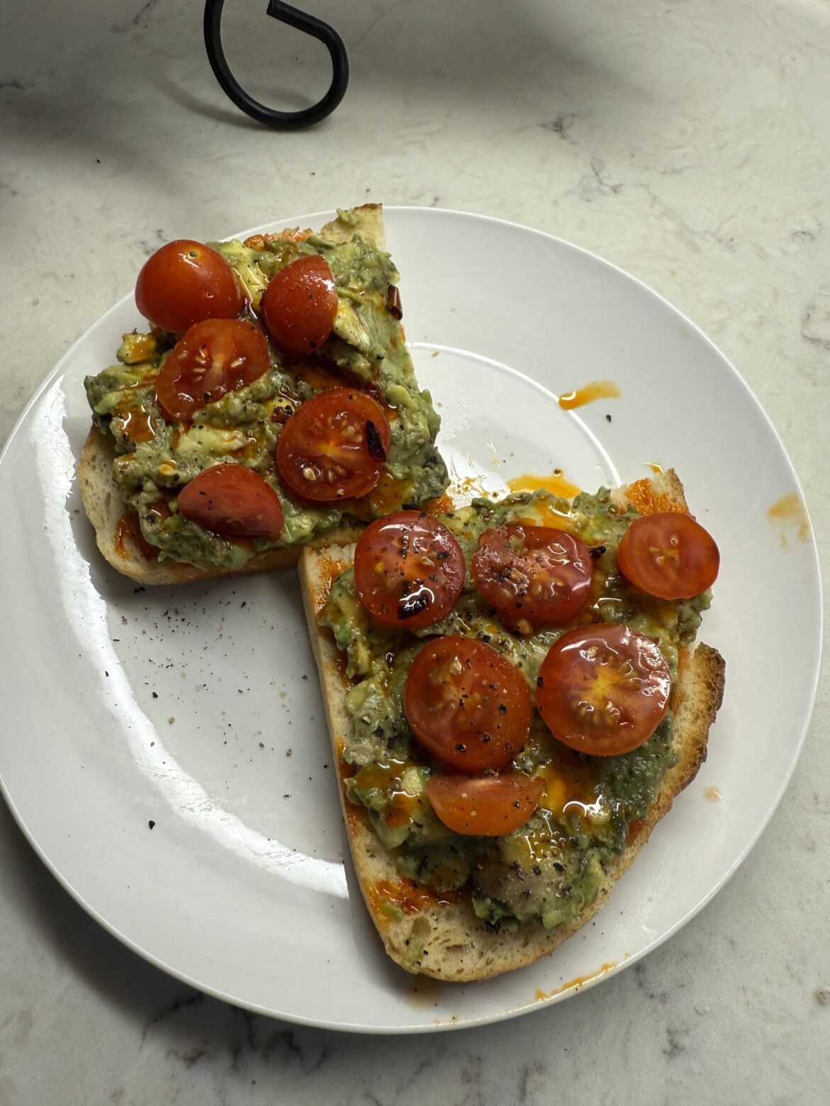 Avocado Toast with tomatoes and chili oil