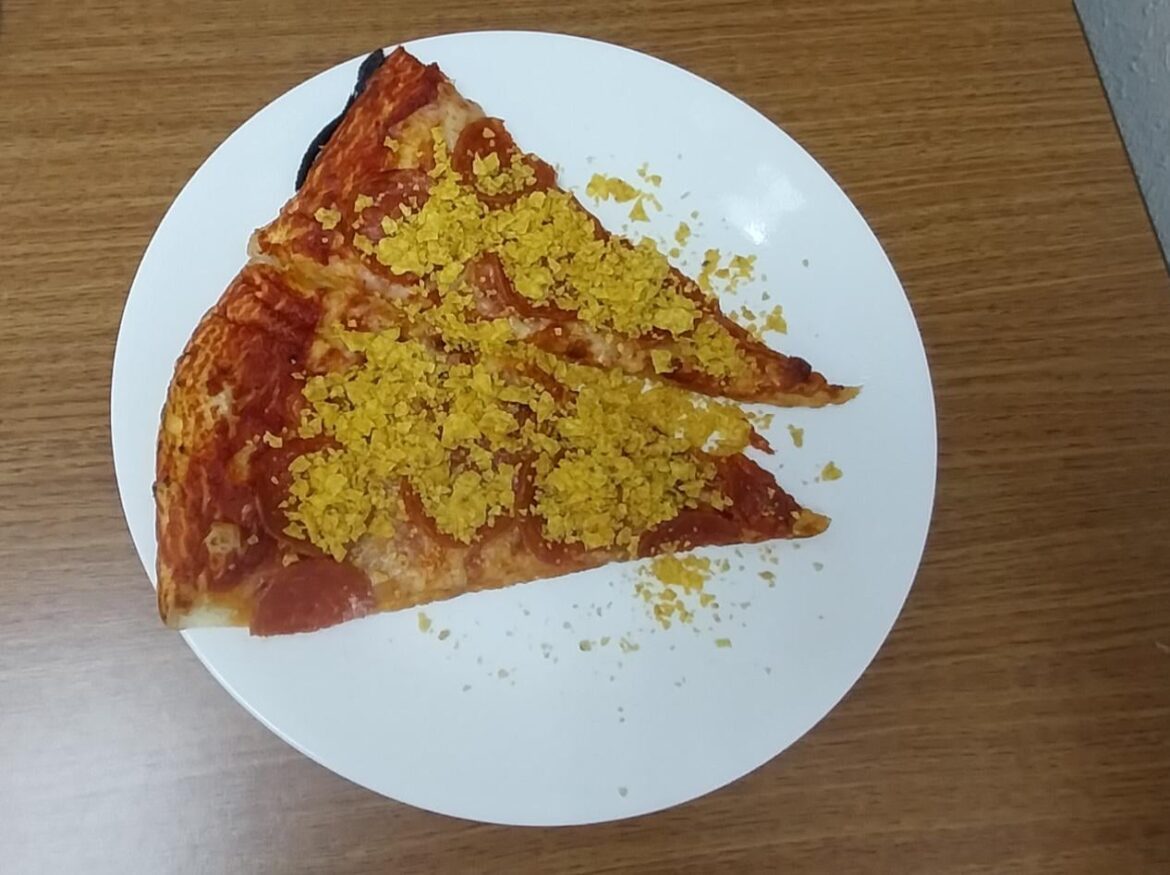Costco pizza with crushed up cool ranch Doritos, because I didn't have parmesan cheese.
