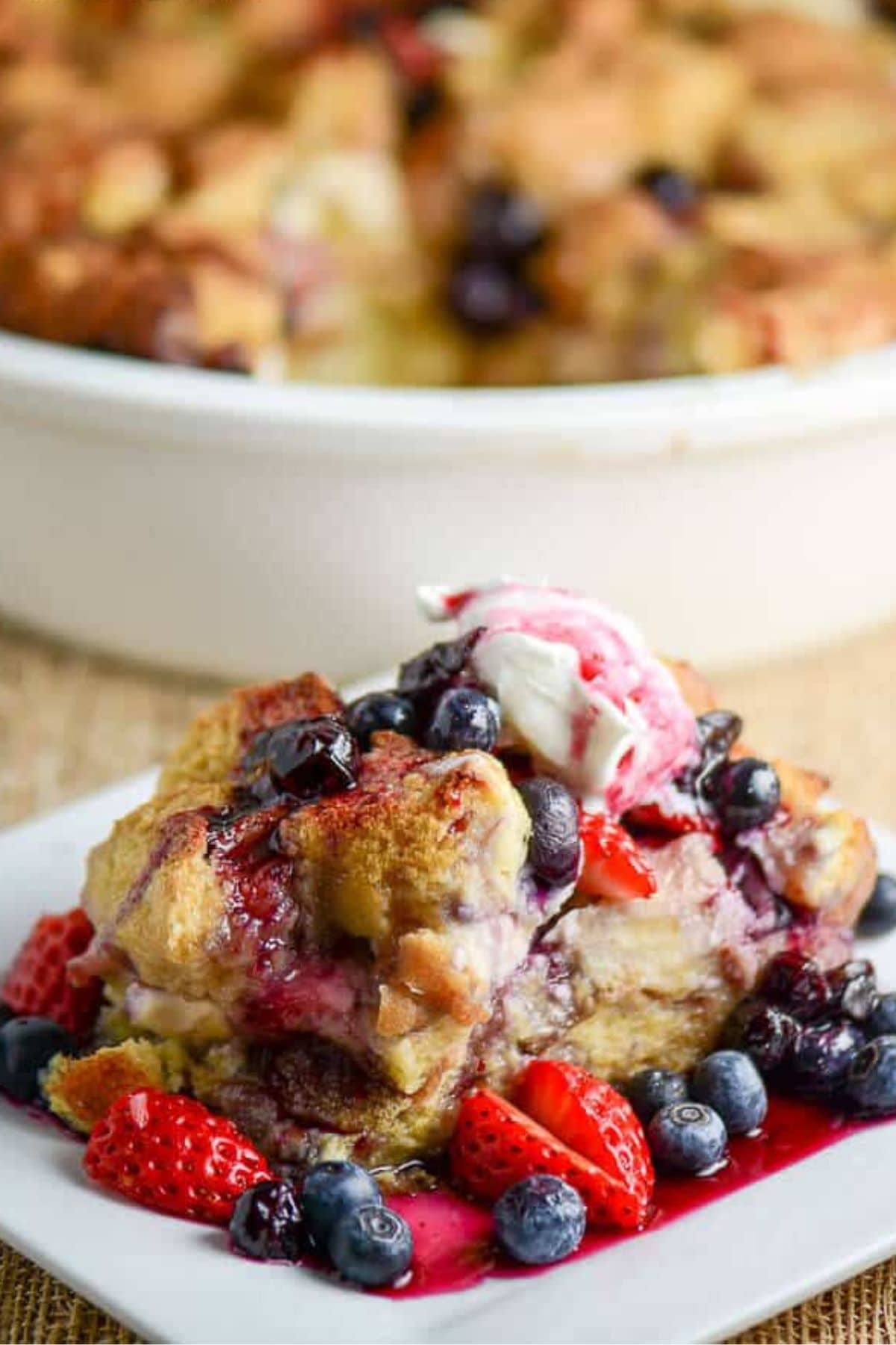 These 35 Scrumptious Make Ahead Brunch Casseroles will make your life over the holidays so much easier. Plus, everyone will be delighted with any one of these casseroles for the holidays. Berry french toast on plate.