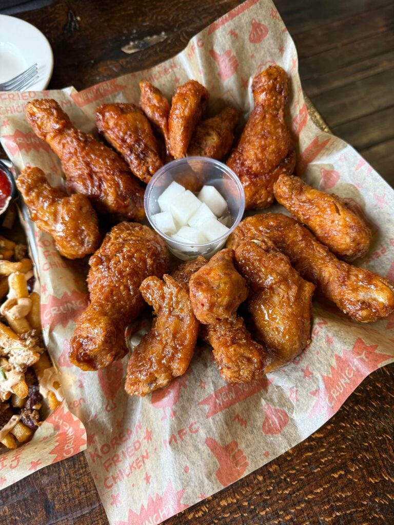 Korean Fried Chicken Wings & Drumsticks with Beef Chili Fries from Mad for Chicken. A Flushing, Queens original that has held up pretty well with its chain expansion.