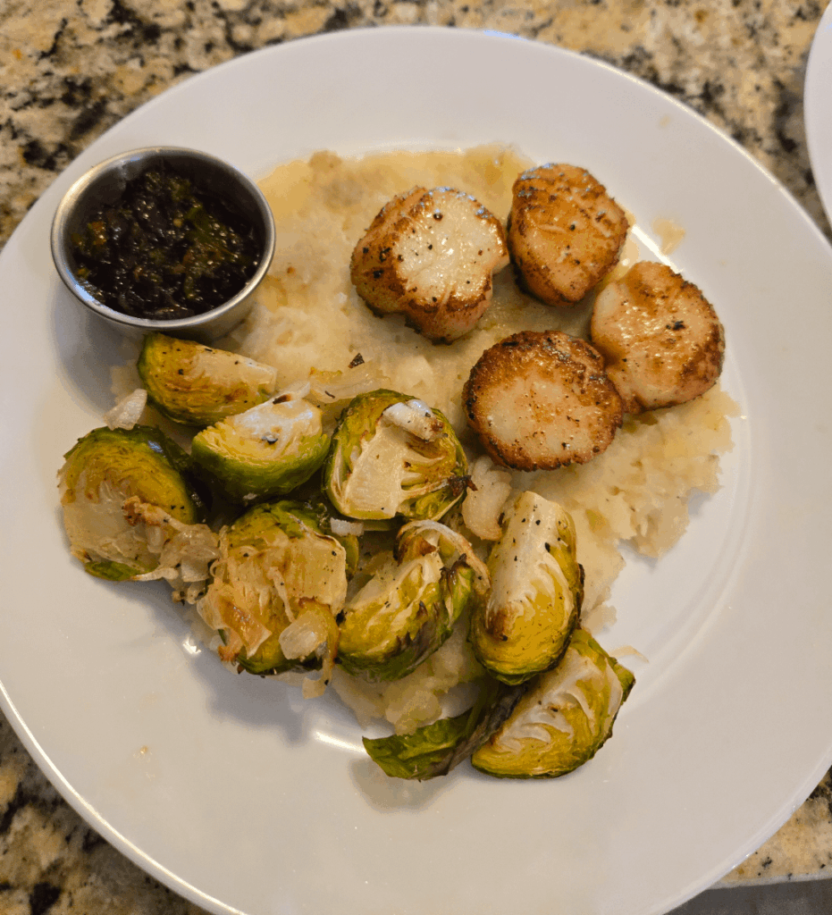 Tried the scallops with orange-cranberry gastrique. It was amazing! Tried the scallops with orange-cranberry gastrique. It was amazing!