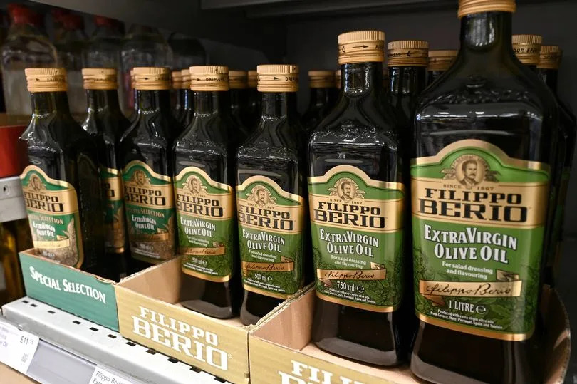 LEIGH, ENGLAND - SEPTEMBER 26: Bottles of Filippo Berio branded extra virgin olive oil are displayed for sale on a supermarket shelf on September 26, 2024 in Leigh-on-Sea, United Kingdom. Olive oil prices are reported to drop significantly by the end of the year, according to olive oil producers with a price decrease of 30-40% due to a substantial increase in production. Mediterranean producers forecast a much better-than-expected olive this autumn which could bring an end to the record-high olive oil prices seen over the past couple of years. (Photo by John Keeble/Getty Images)