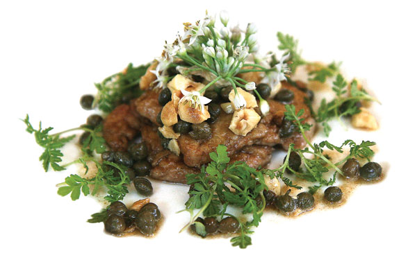 Sauteed calves' brains with fried hazelnuts and capers