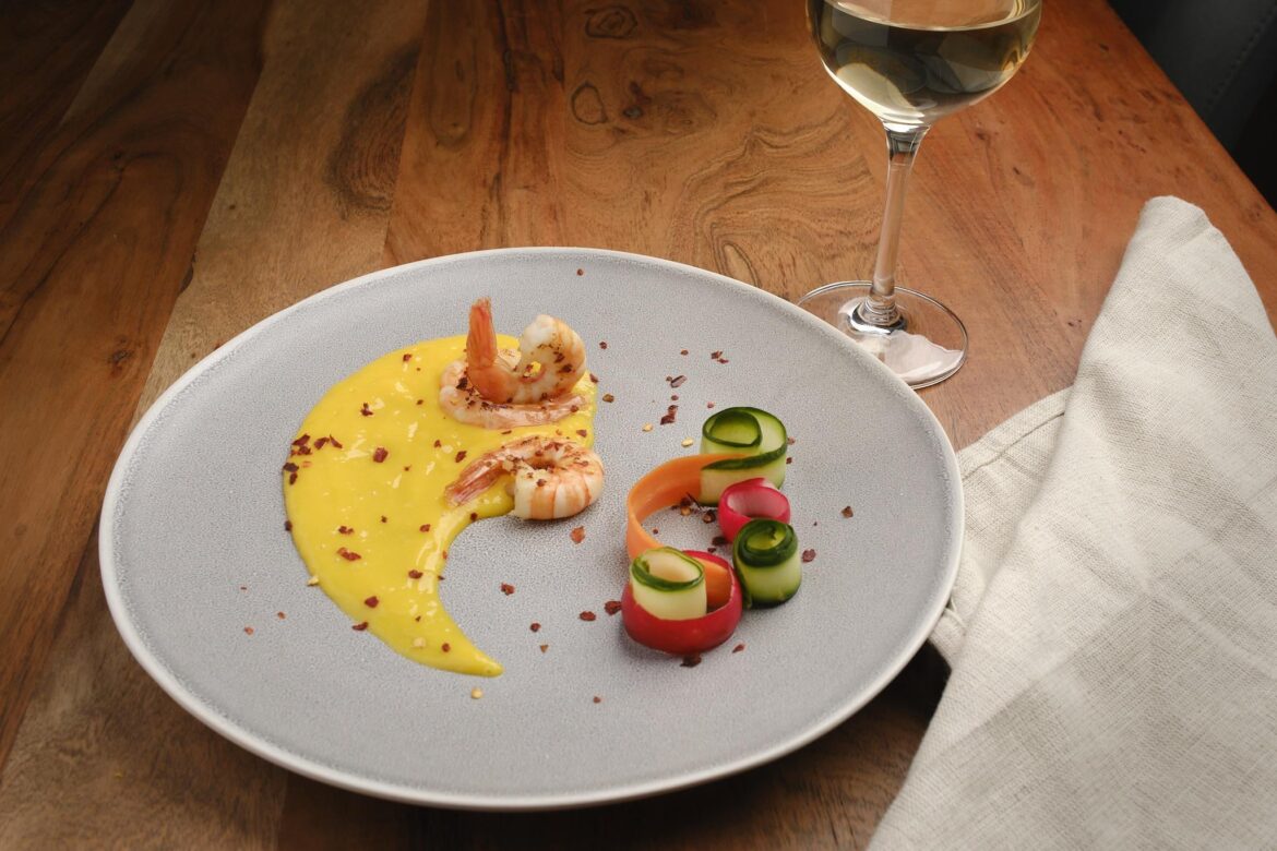 Grilled shrimp with a mango-lime purée and pickle vegetables