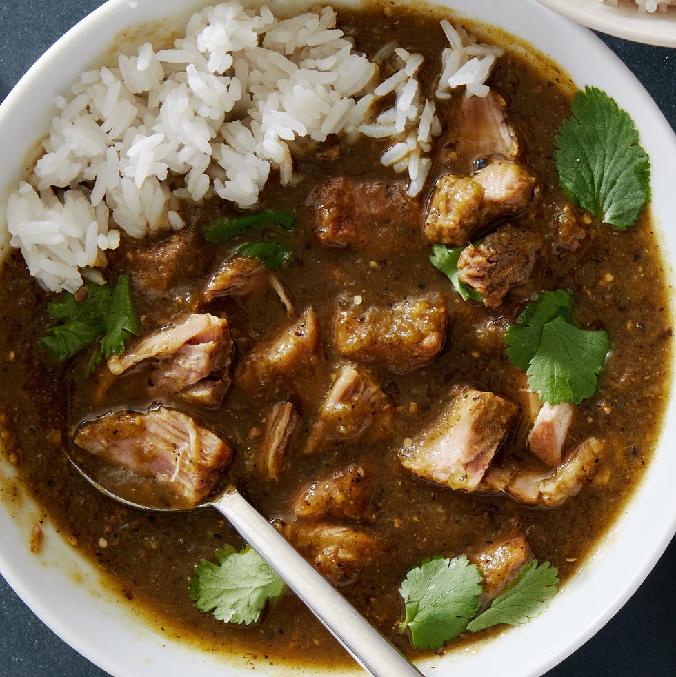 chile verde with white rice in a white bowl