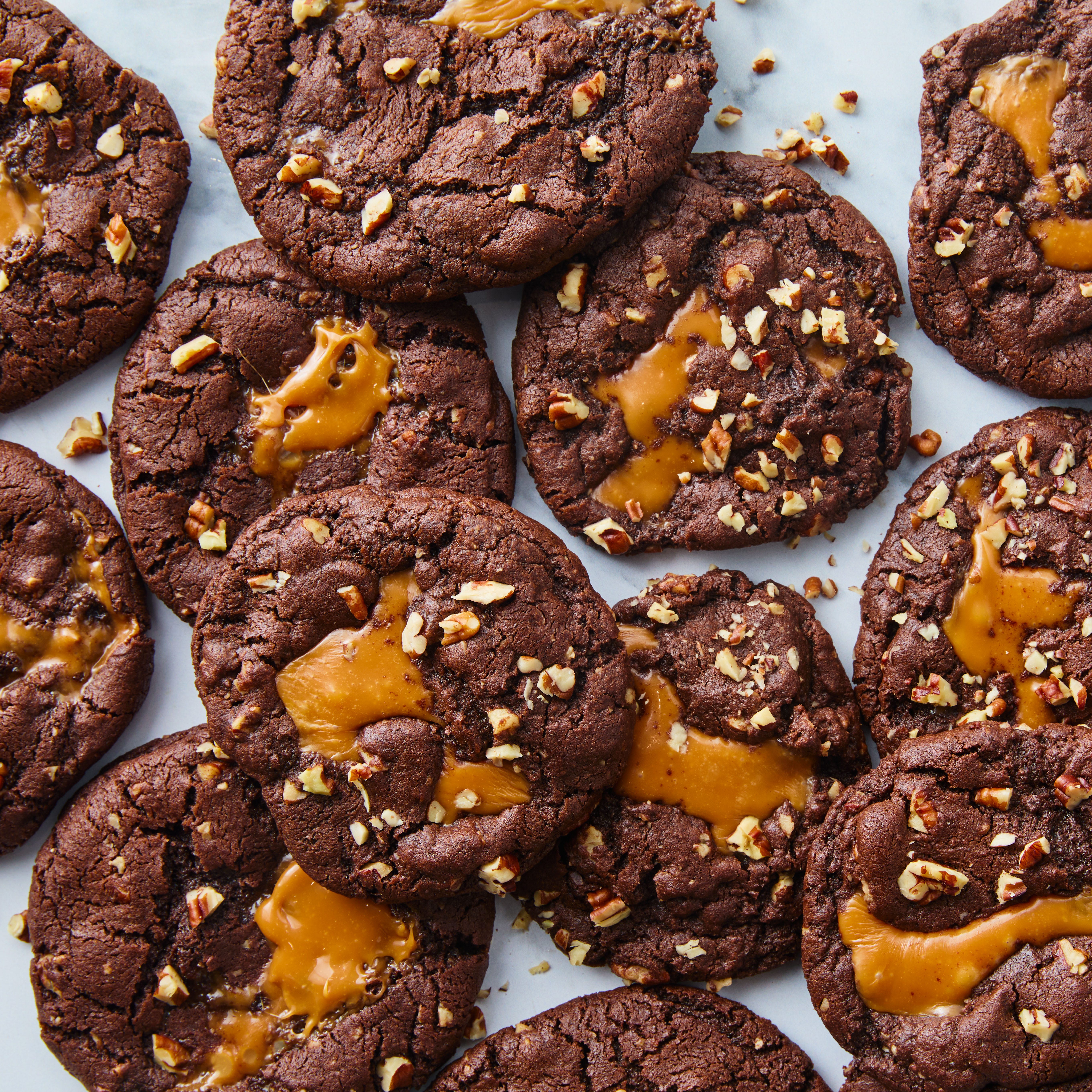 chocolate cookies with caramel and chopped pecans