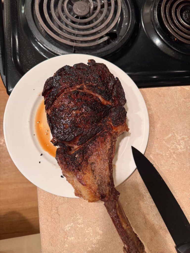 Made myself a birthday cowboy ribeye.