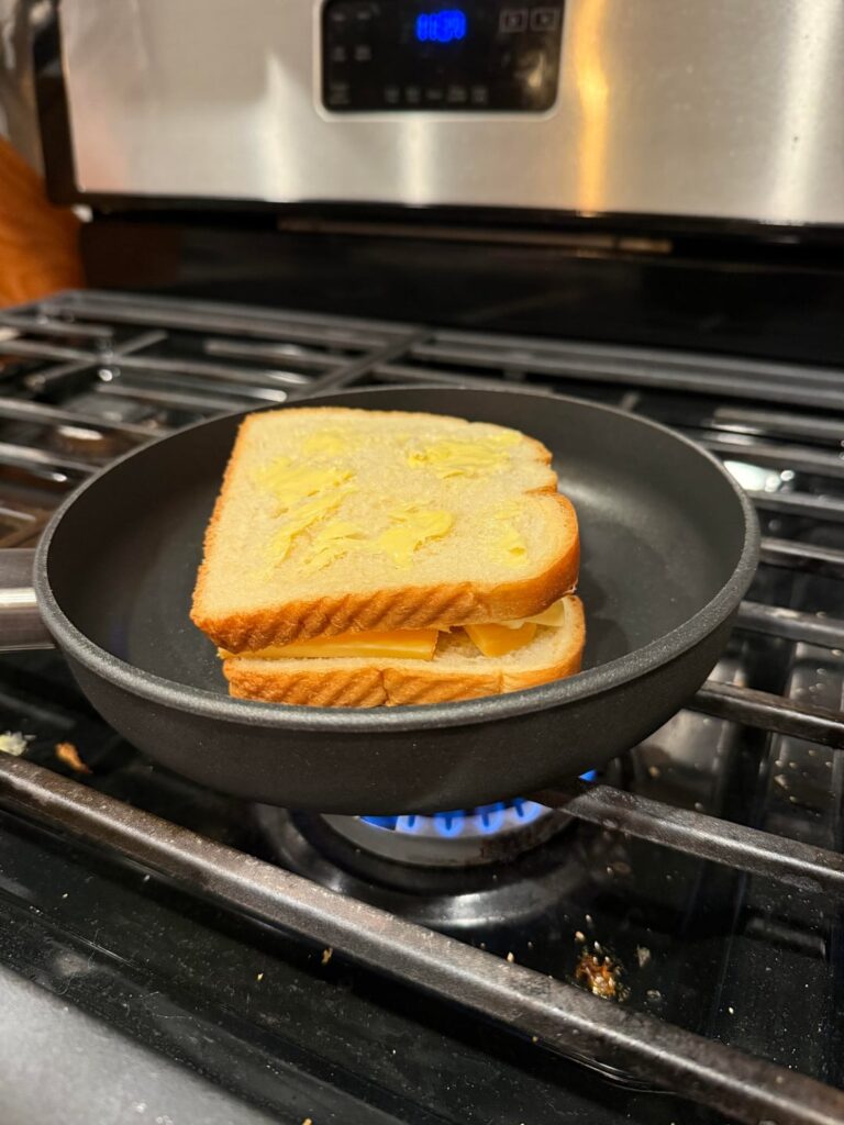 I stacked this bad boy. Cheddar cheese curds, smoked Gouda, and havarti. Hawaiian bread with butter.