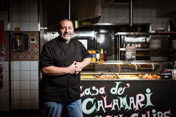 Kostas Starakis operates side-by-side stalls selling meatballs and calamari, and says trade is steady.