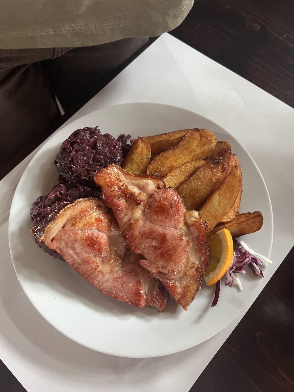 Smoked pork knuckle with cabbage and deep-fried potatoes