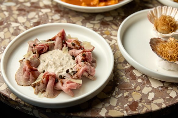 Beef carpaccio with truffle mayo, fried capers, shallots, reggiano.