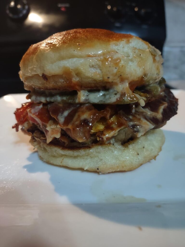 A sloppy cheeseburger, smushed in a foil wrapper for that fast food-y feel