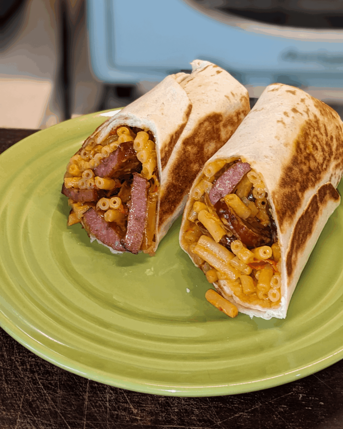 2am Mac&Cheese Burrito w smoked sausage, fried peppers + onions