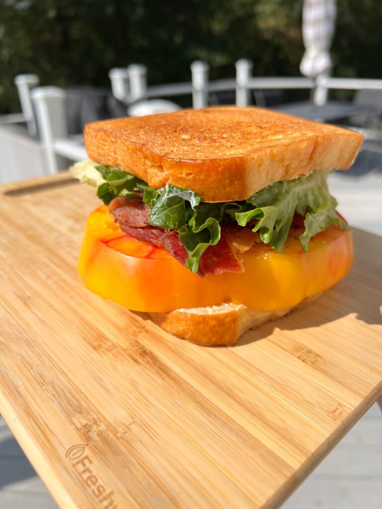 BLT with homegrown heirloom tomato and brioche toasted in bacon fat