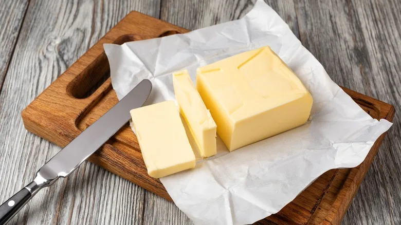 Butter on wooden board