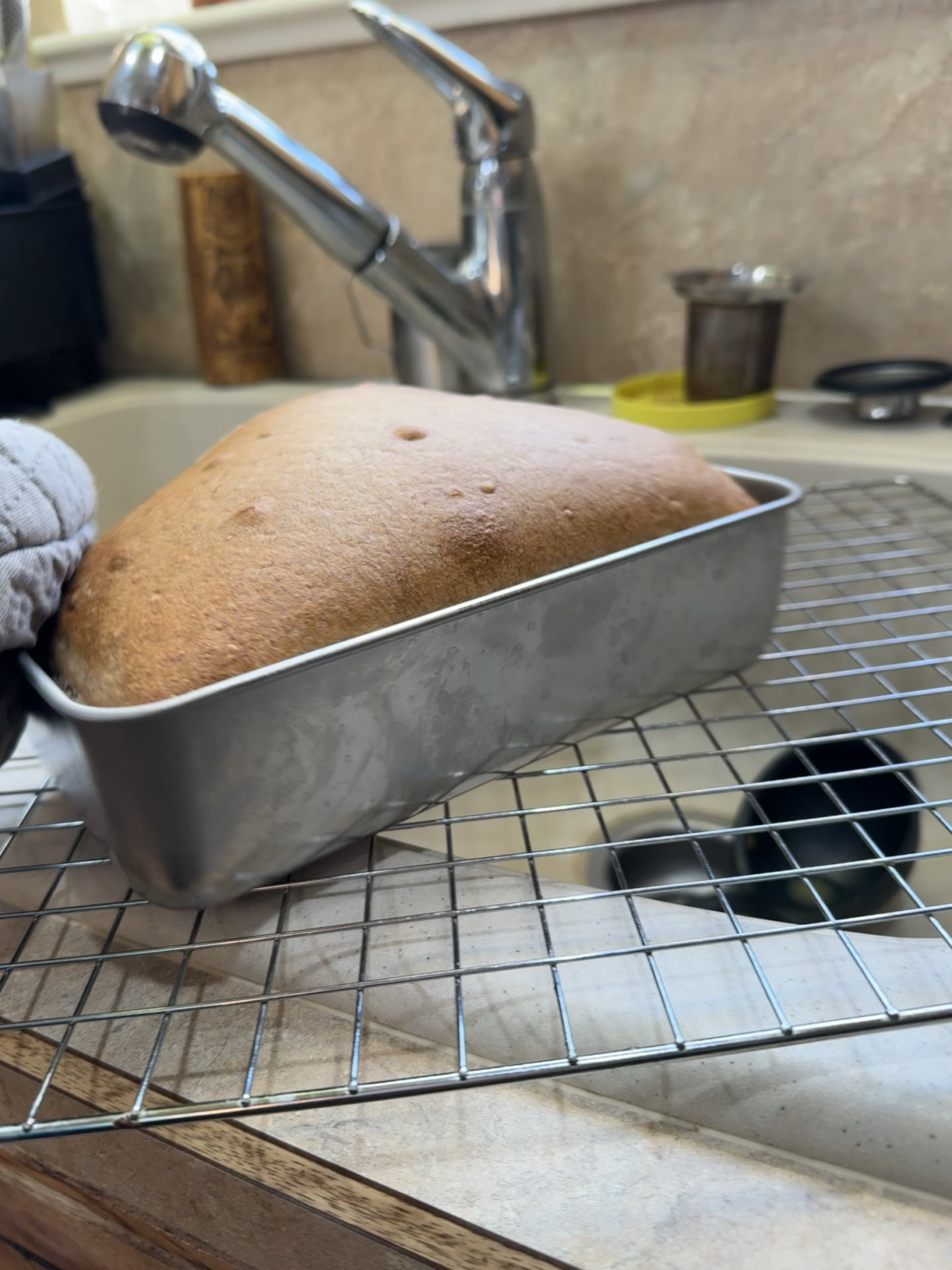 My sandwich loaf keeps blowing out on the side.