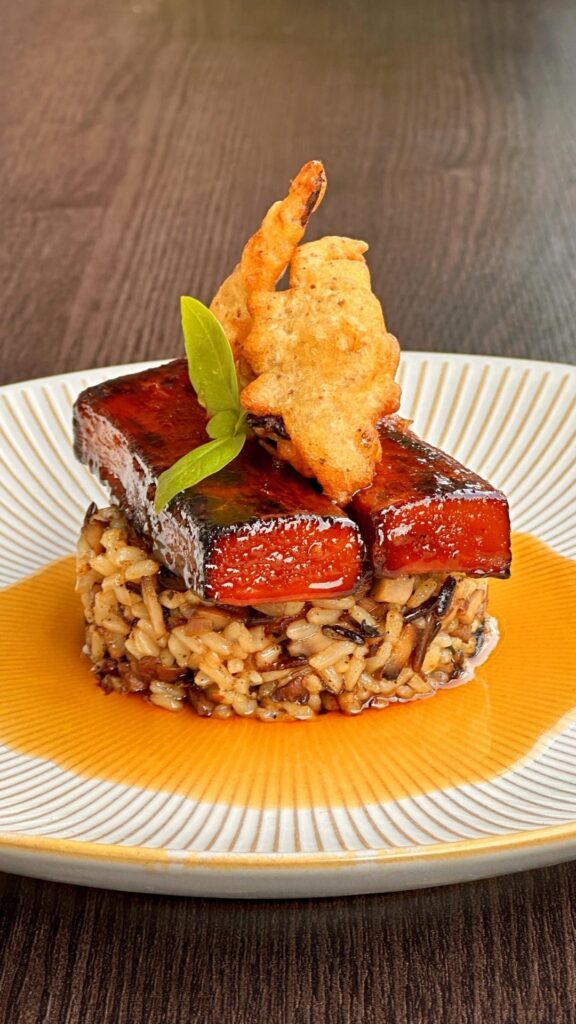 Jerusalem artichoke glazed with a honeycrisp bourbon glaze, fried wild rice, tempura shallot, and a smoked apple & thyme gastrique.