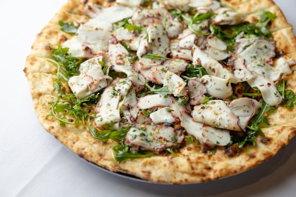 The focaccia di polpo with a layer of octopus carpaccio, rocket, lemon and oregano.