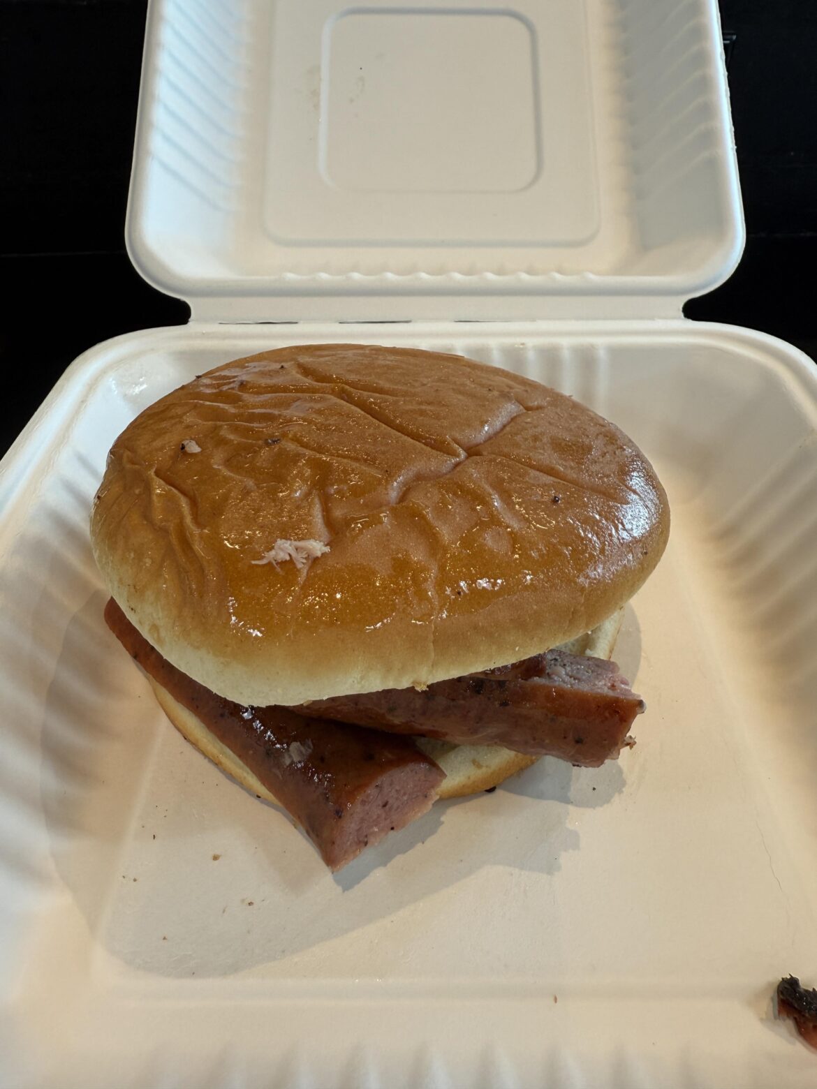 Airport Salt Lick is now serving sausage sandwiches on burger buns. :(
