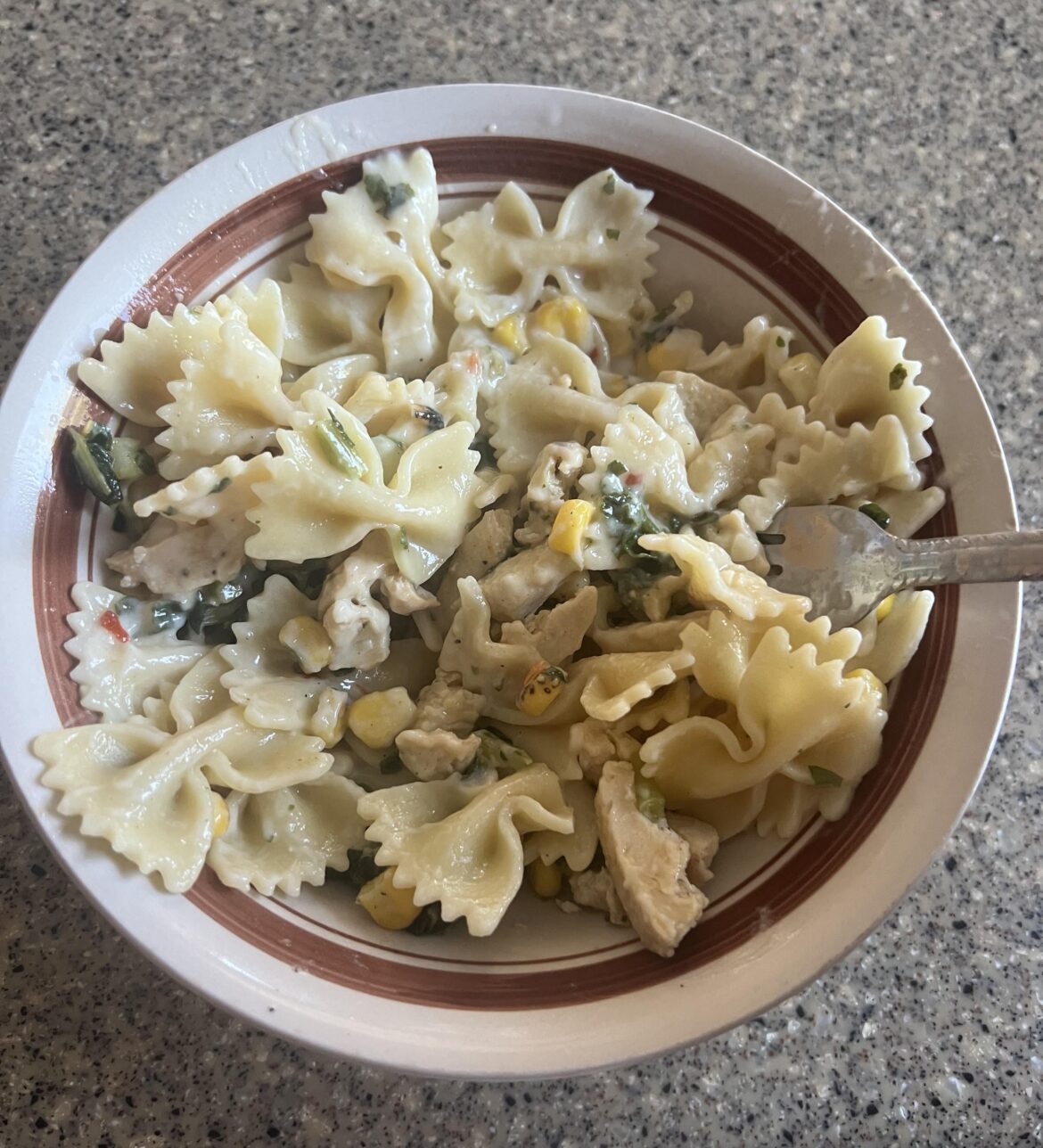 Farelle with charred corn and chicken bowl