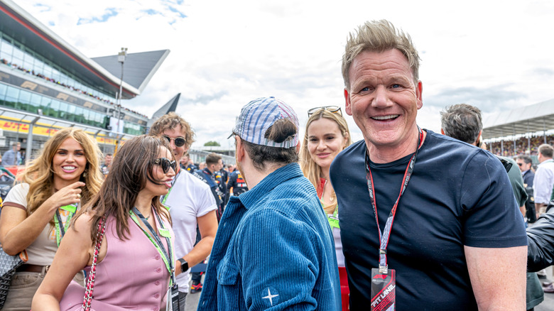 Photo of Gordon Ramsay and friends at outdoor event