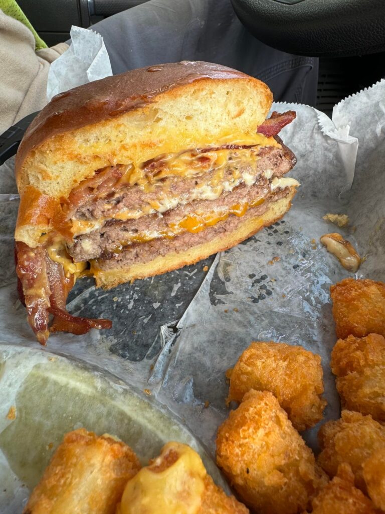 Triple patty burger from a local bar. Amazing.